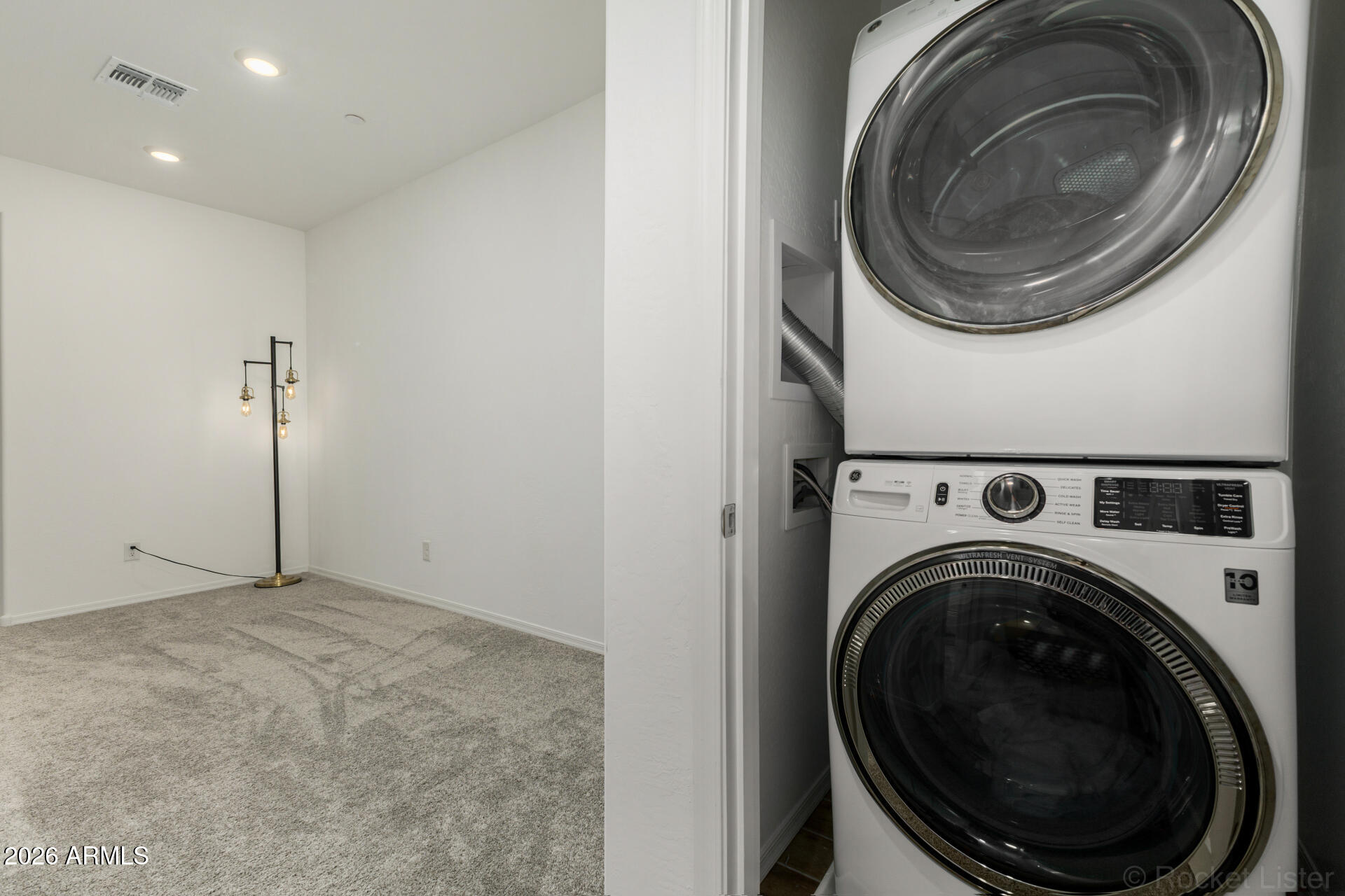 1917 East Hampton Lane, Unit 104 Gilbert, AZ 85295 - Photo 23 of 39 a view of a storage & utility room with washer and dryer