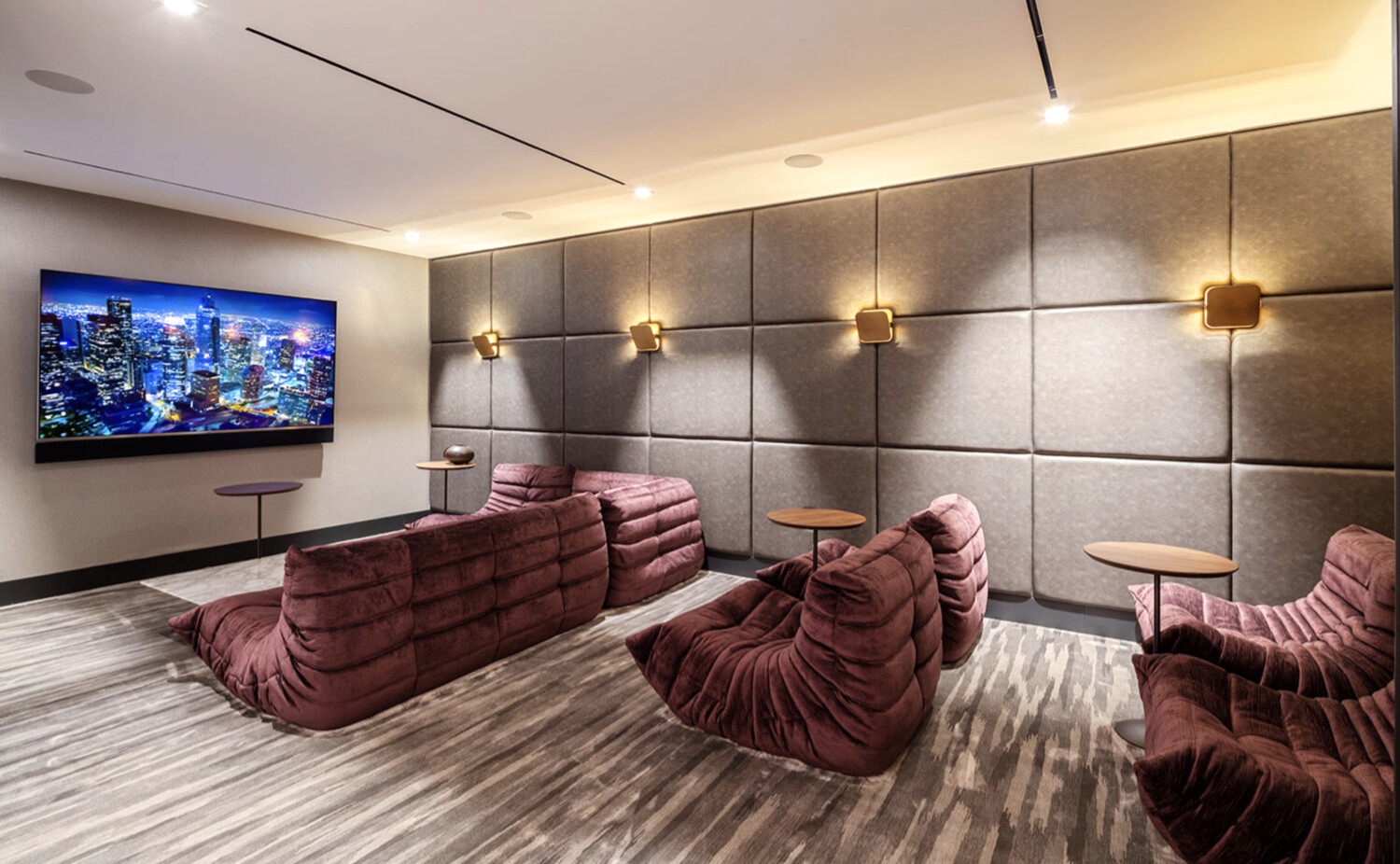 91 Leonard Street, Unit 8B Manhattan, NY 10013 - Photo 11 of 16 a living room with a couch and a flat screen tv