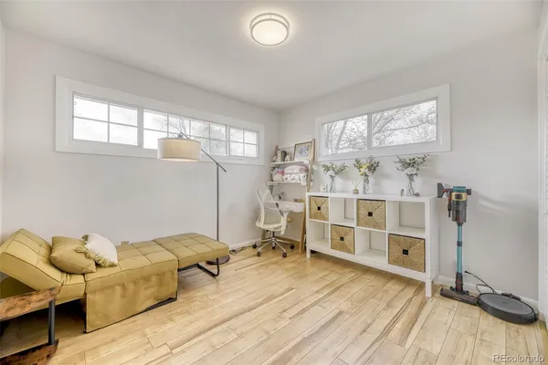 a bed room with a bed and window