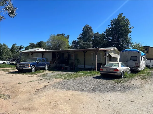 a house view with a garden space