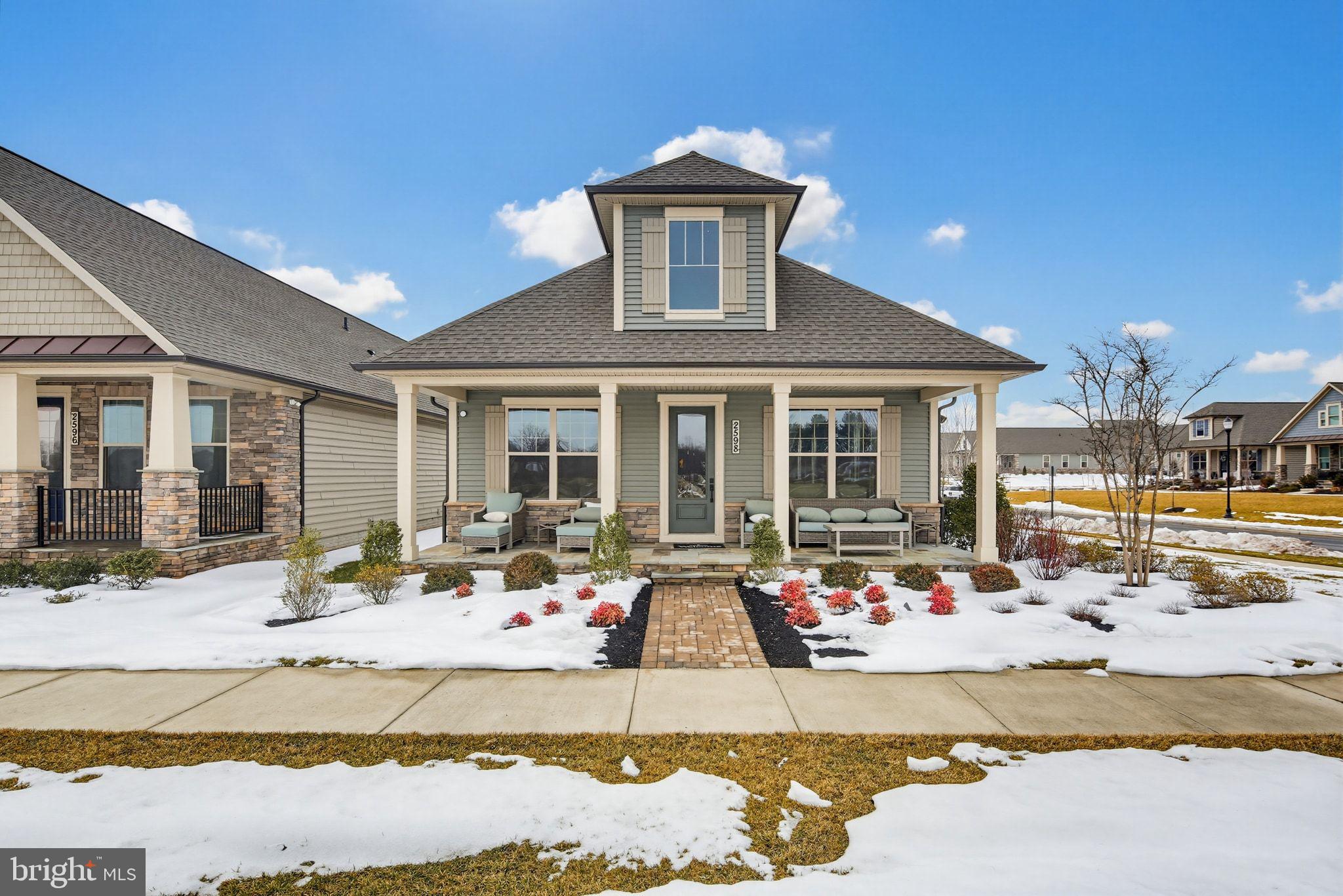 a front view of a house with a patio