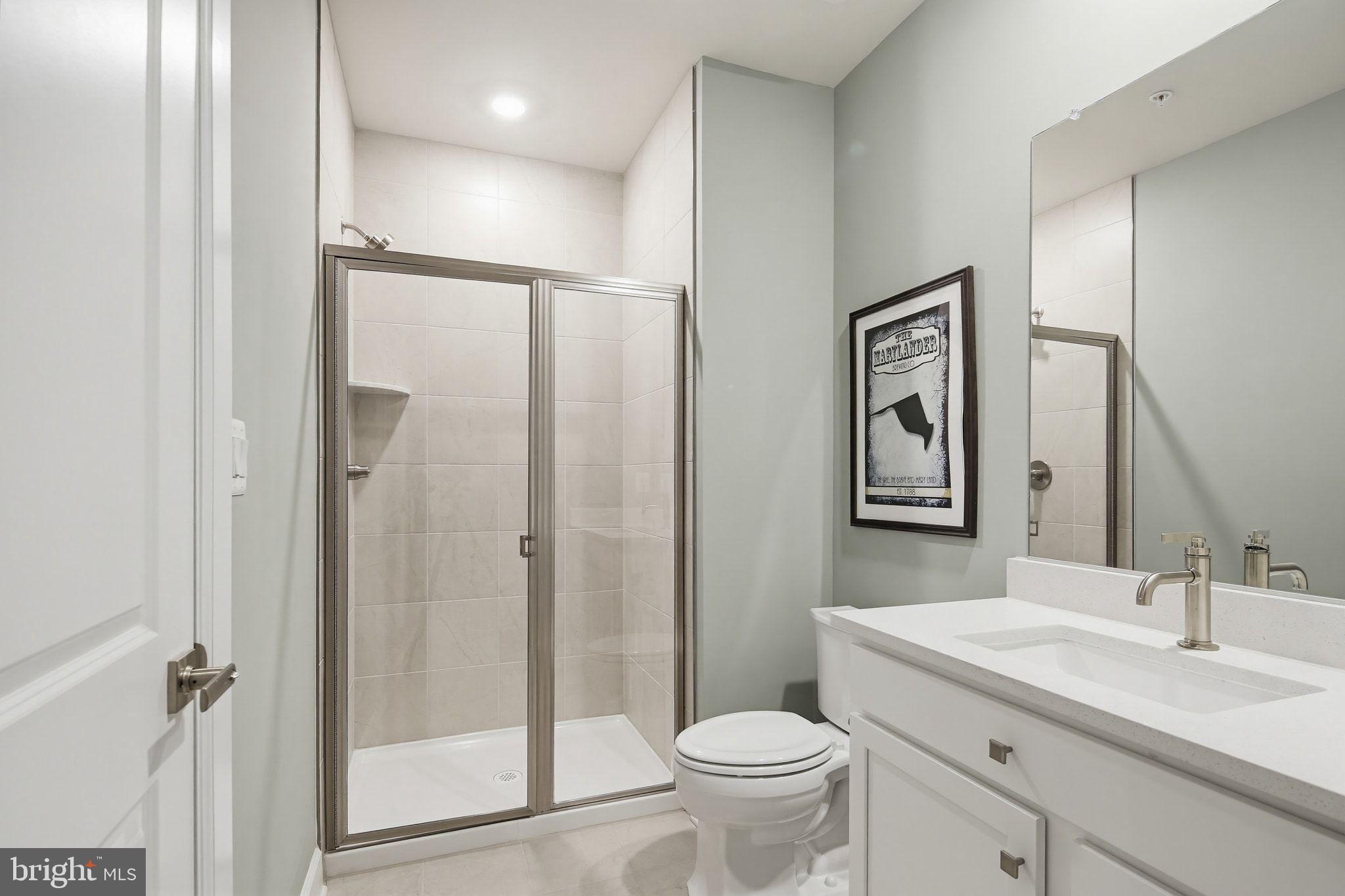 2598 Potting Shed Way Frederick, MD 21702 - Photo 27 of 32 a bathroom with a sink toilet and shower