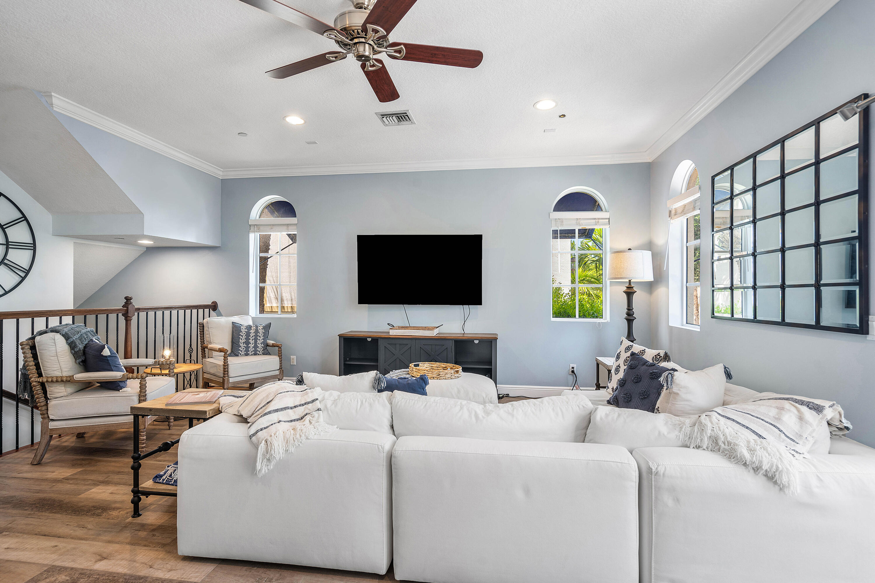 3261 Estancia Way Boynton Beach, FL 33435 - Photo 11 of 51 a room with a bed a couch and a flat screen tv