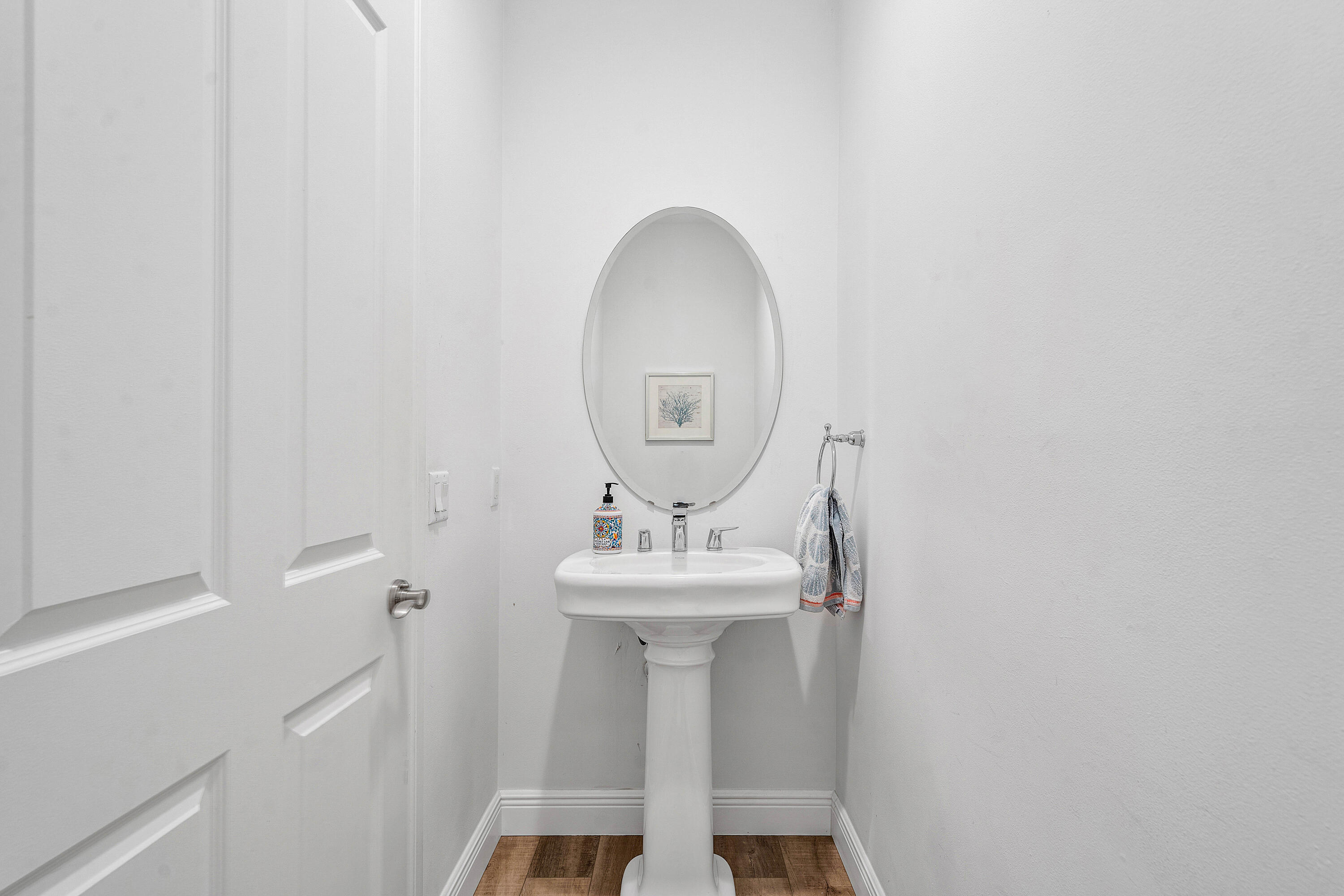 3261 Estancia Way Boynton Beach, FL 33435 - Photo 22 of 51 a bathroom with a sink and a mirror
