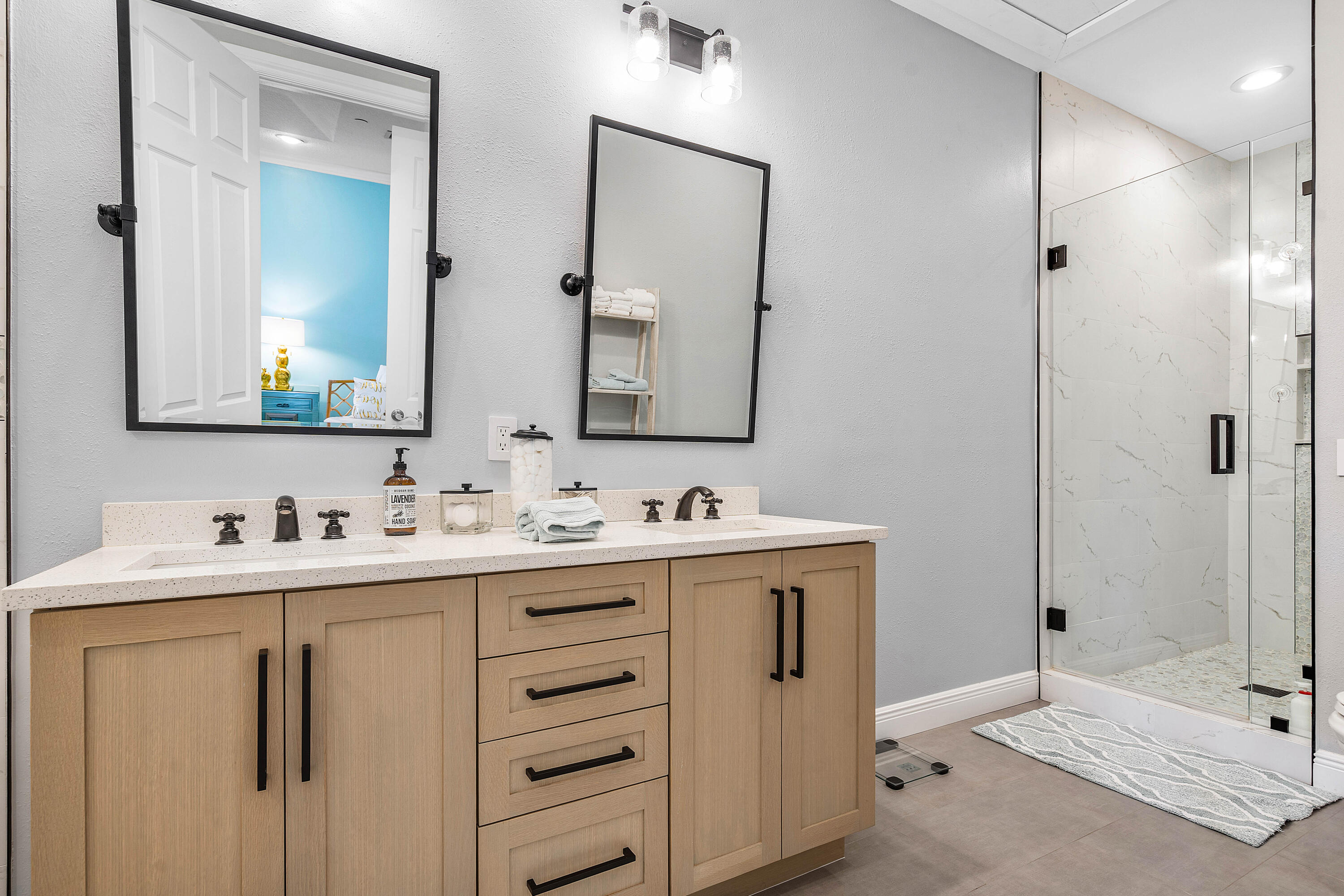 3261 Estancia Way Boynton Beach, FL 33435 - Photo 25 of 51 a bathroom with double sink and a mirror