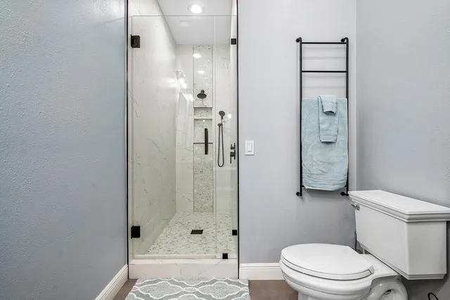 a bedroom with a bed and closet