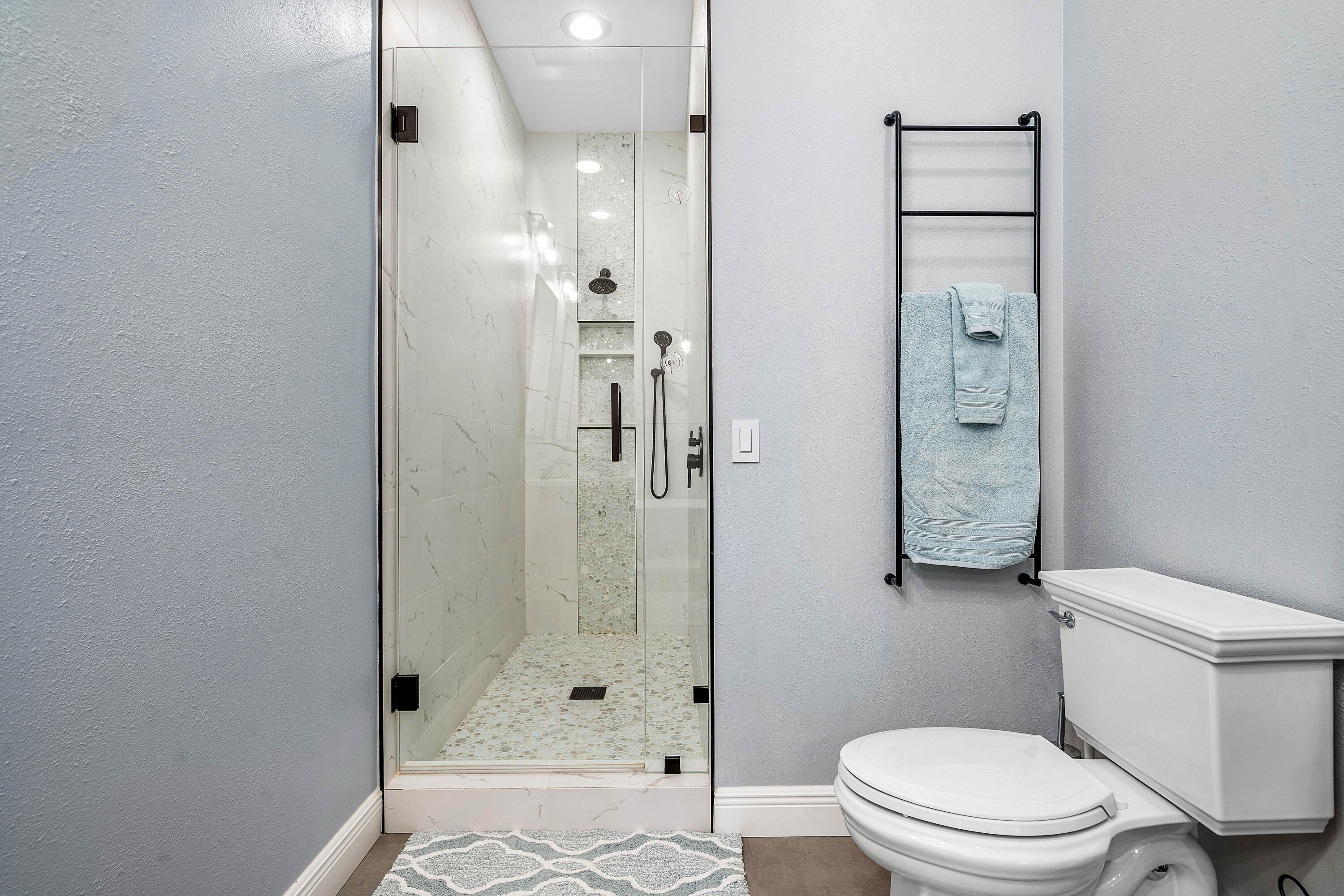 3261 Estancia Way Boynton Beach, FL 33435 - Photo 28 of 51 a bathroom with a shower and a toilet