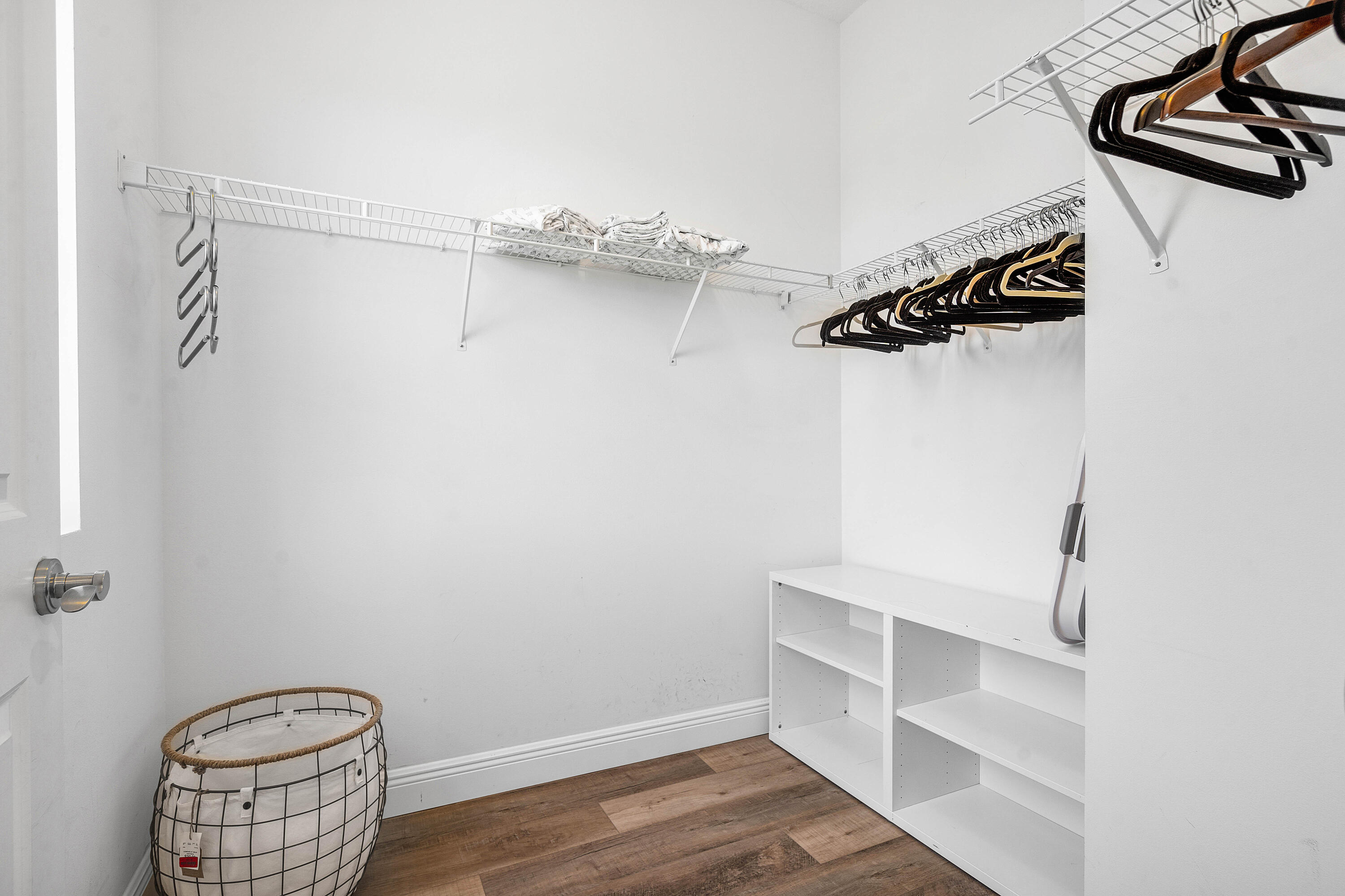 3261 Estancia Way Boynton Beach, FL 33435 - Photo 30 of 51 a view of walk in closet with empty racks