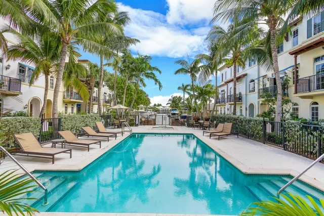 a view of a lake with a house in the background