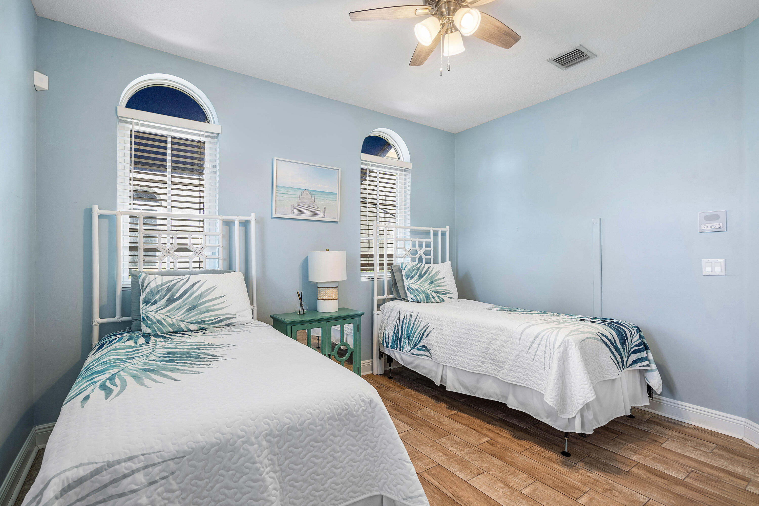 3261 Estancia Way Boynton Beach, FL 33435 - Photo 6 of 51 a bedroom with two beds and a chandelier