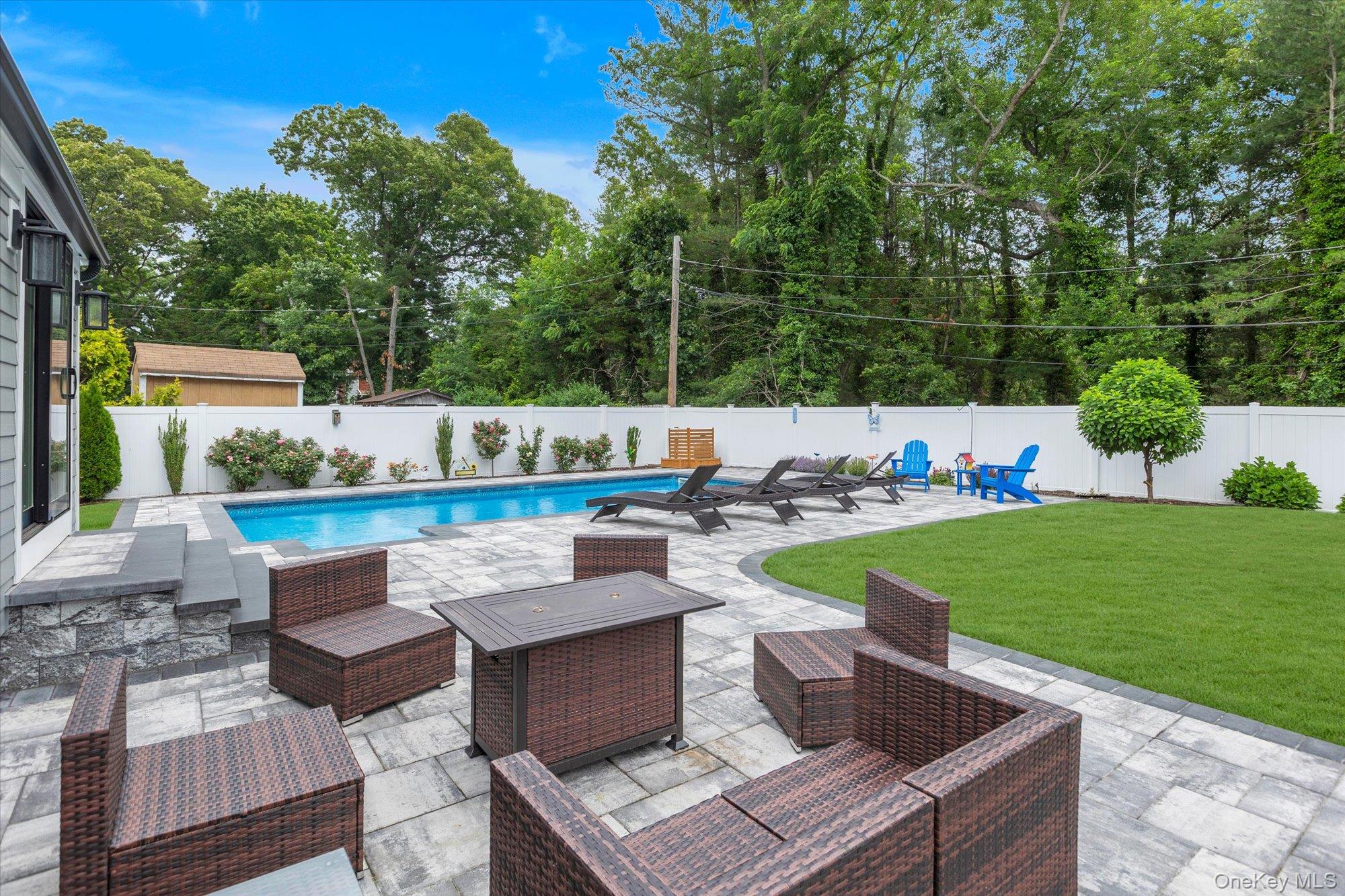 31 Apple Lane Commack, NY 11725 - Photo 22 of 28 Beautiful stone pavers lead to pool area.