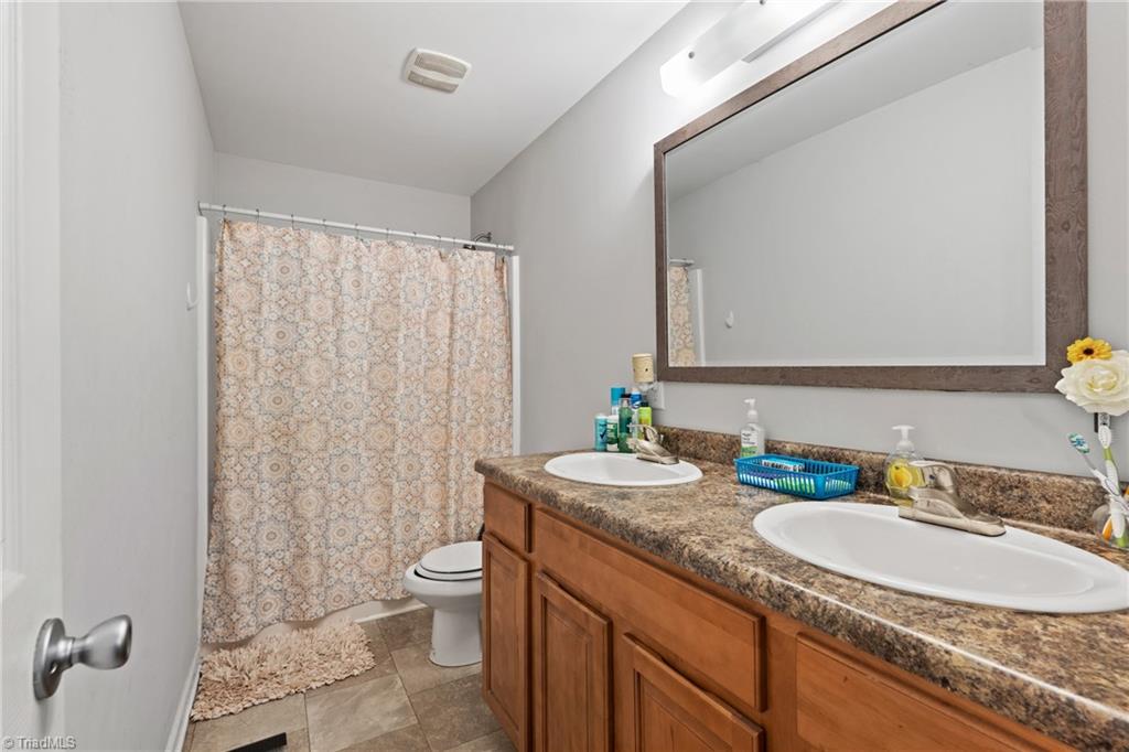 1000 Old Linwood Road Lexington, NC 27292 - Photo 18 of 32 Secondary bathroom with double sinks