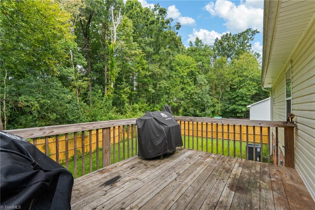 1000 Old Linwood Road Lexington, NC 27292 - Photo 22 of 32 Large deck overlooking the fenced back-yard