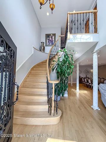 a view of entryway livingroom and hall