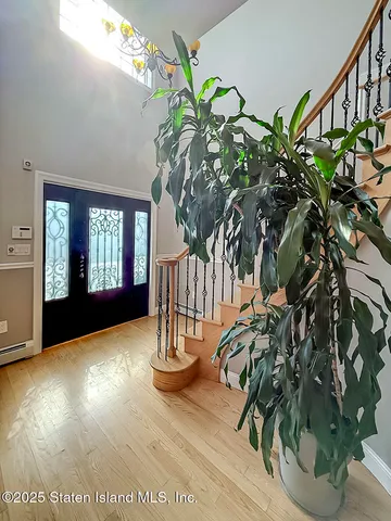 a view of entryway with flower pots
