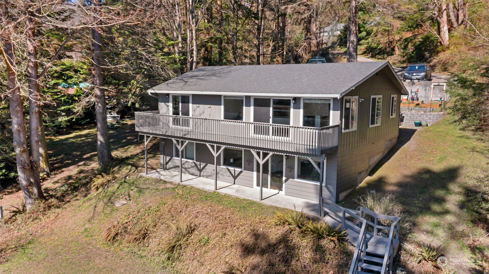 2097 Gull Way Camano Island, WA 98282 - Photo 1 of 35 a house with trees in the background