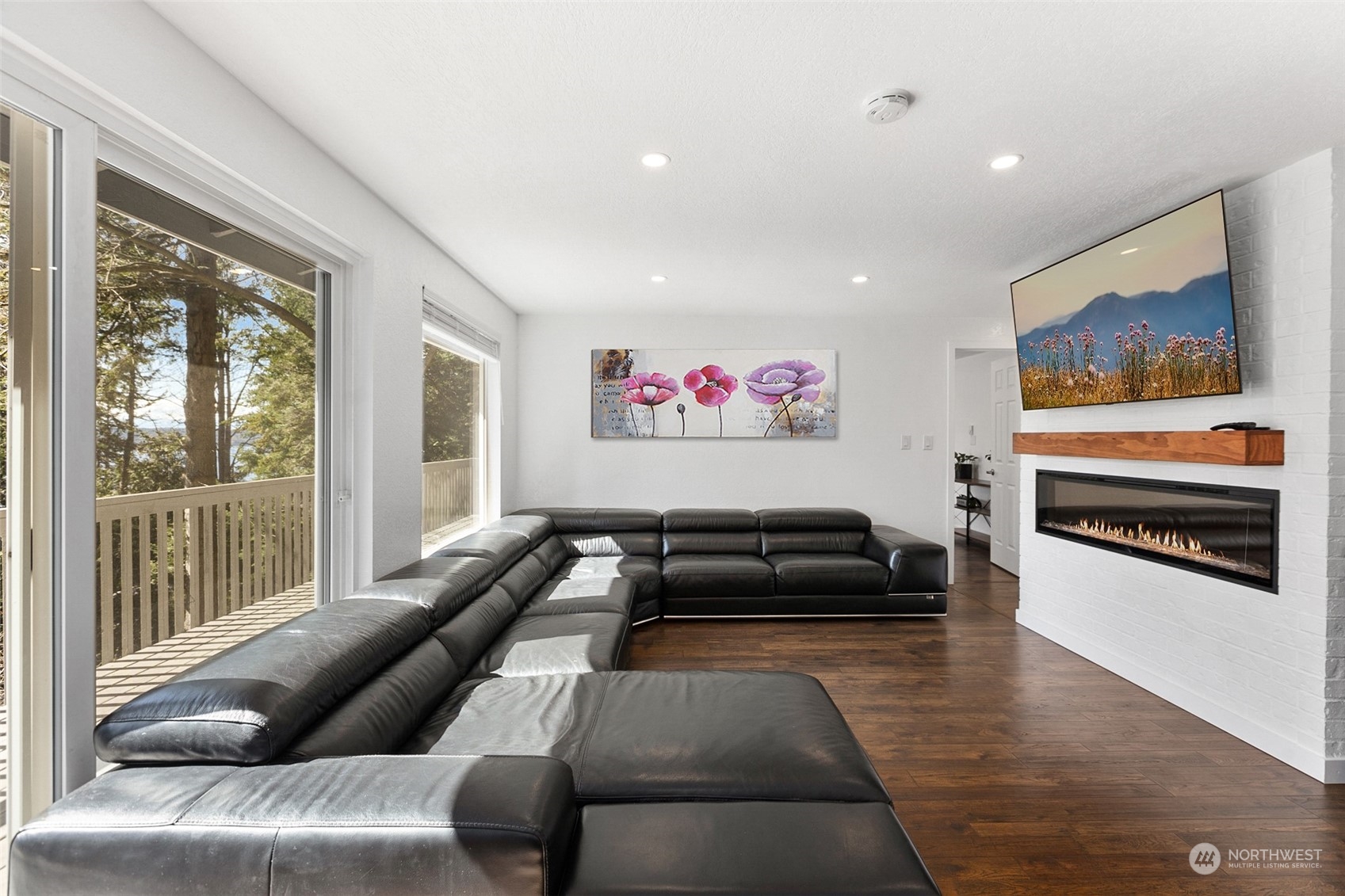 2097 Gull Way Camano Island, WA 98282 - Photo 11 of 35 a living room with furniture and a large window