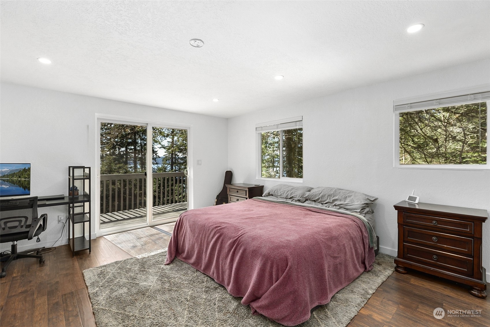 2097 Gull Way Camano Island, WA 98282 - Photo 13 of 35 a bed sitting in a spacious bedroom next to a window