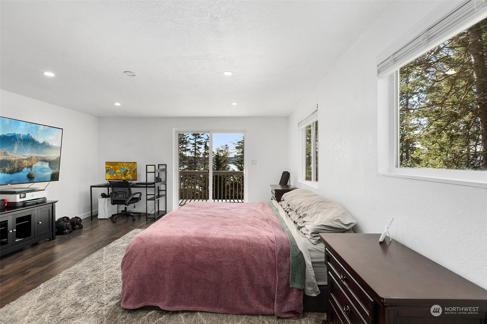 2097 Gull Way Camano Island, WA 98282 - Photo 14 of 35 a bed room with furniture and a flat screen tv