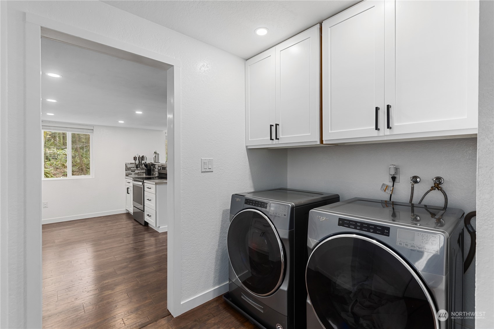 2097 Gull Way Camano Island, WA 98282 - Photo 17 of 35 a view of a storage & utility room with washer and dryer