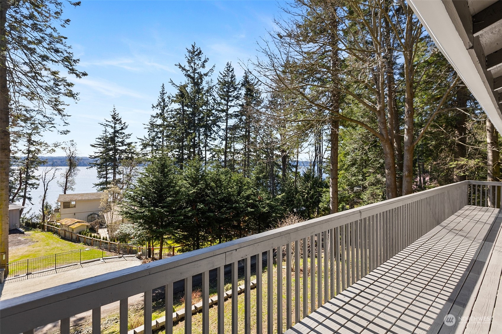 2097 Gull Way Camano Island, WA 98282 - Photo 22 of 35 a view of balcony with wooden floor and fence