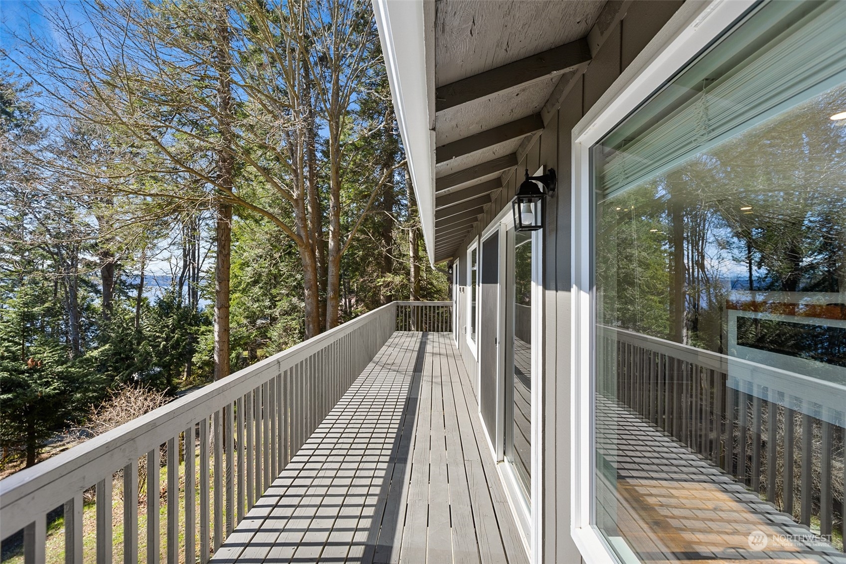 2097 Gull Way Camano Island, WA 98282 - Photo 24 of 35 a view of a balcony with wooden floor and fence