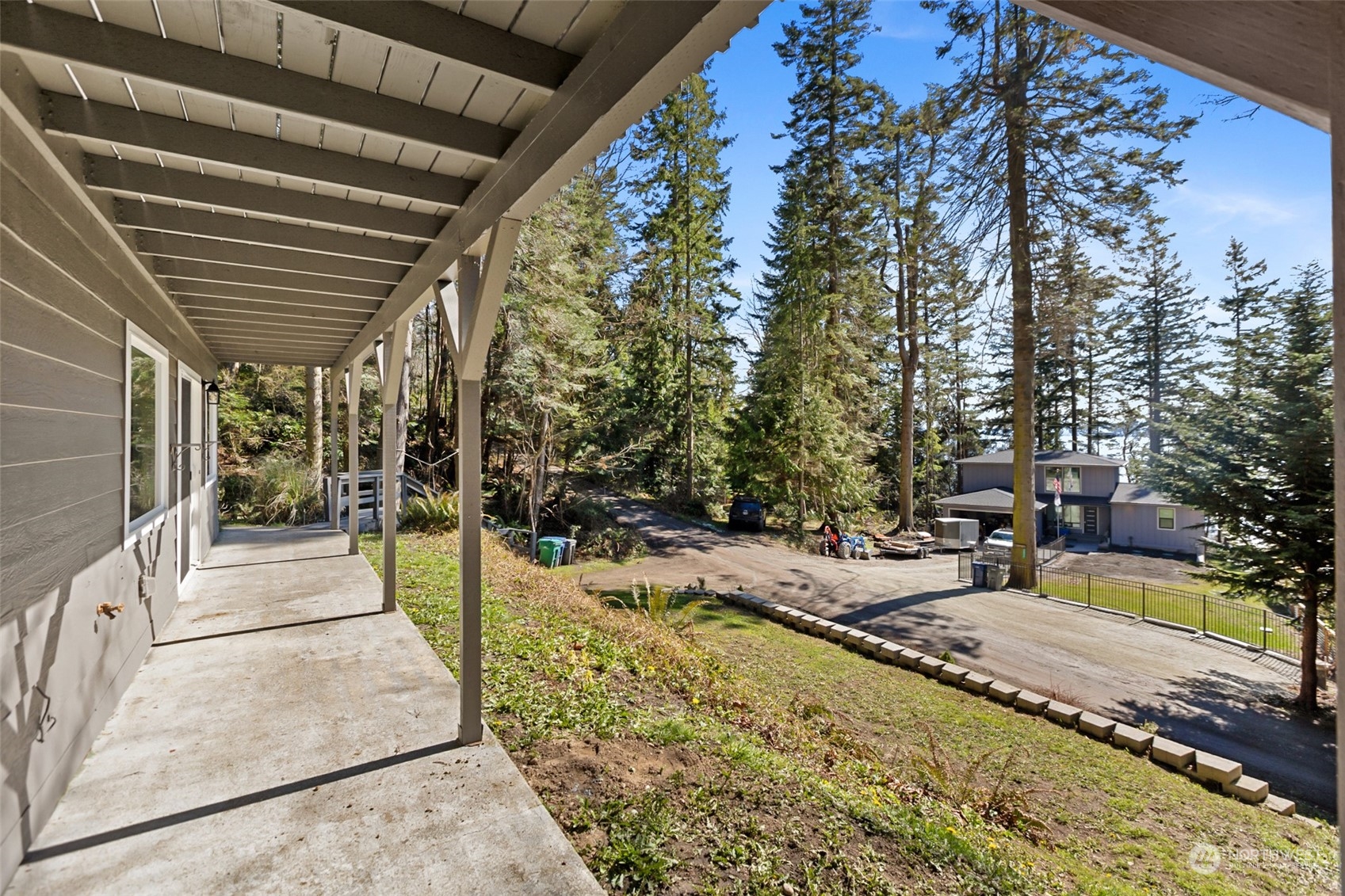 2097 Gull Way Camano Island, WA 98282 - Photo 28 of 35 a view of a backyard with swimming pool