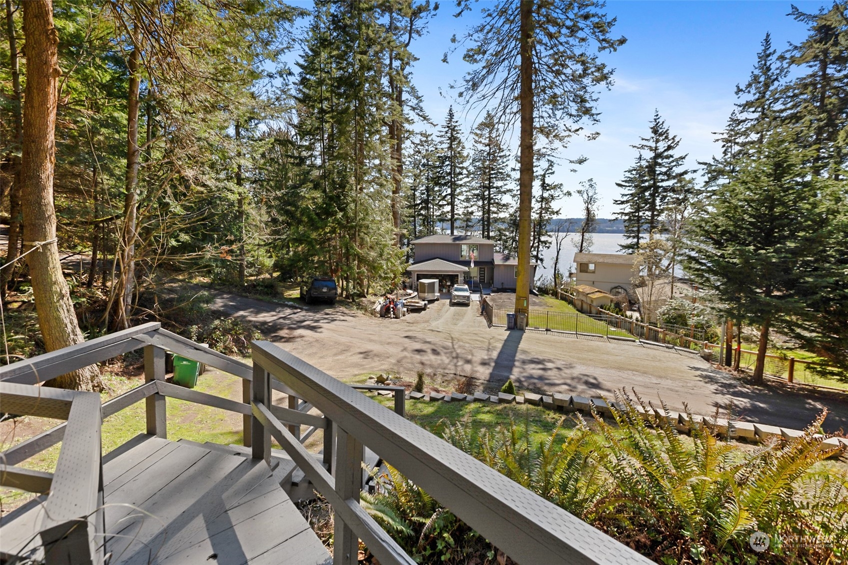 2097 Gull Way Camano Island, WA 98282 - Photo 29 of 35 a view of a swimming pool with a patio and fire pit