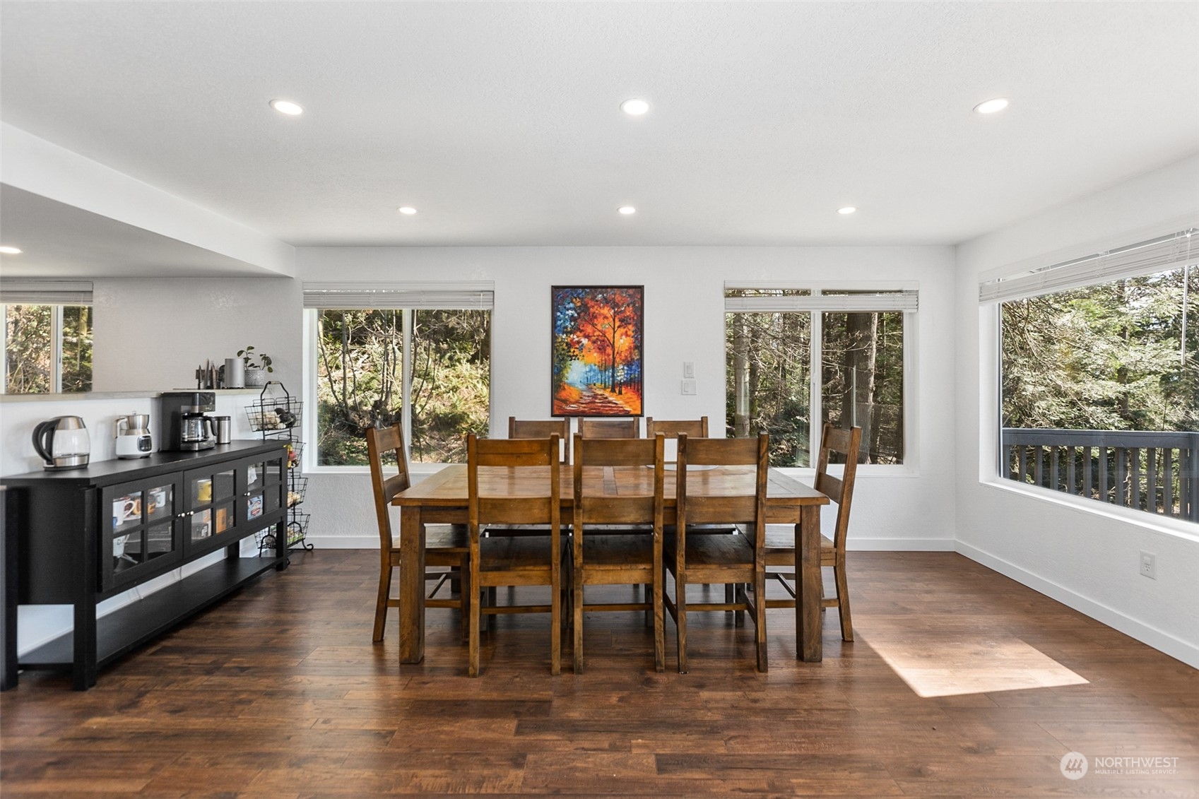 2097 Gull Way Camano Island, WA 98282 - Photo 9 of 35 a view of a dining room with furniture window and wooden floor