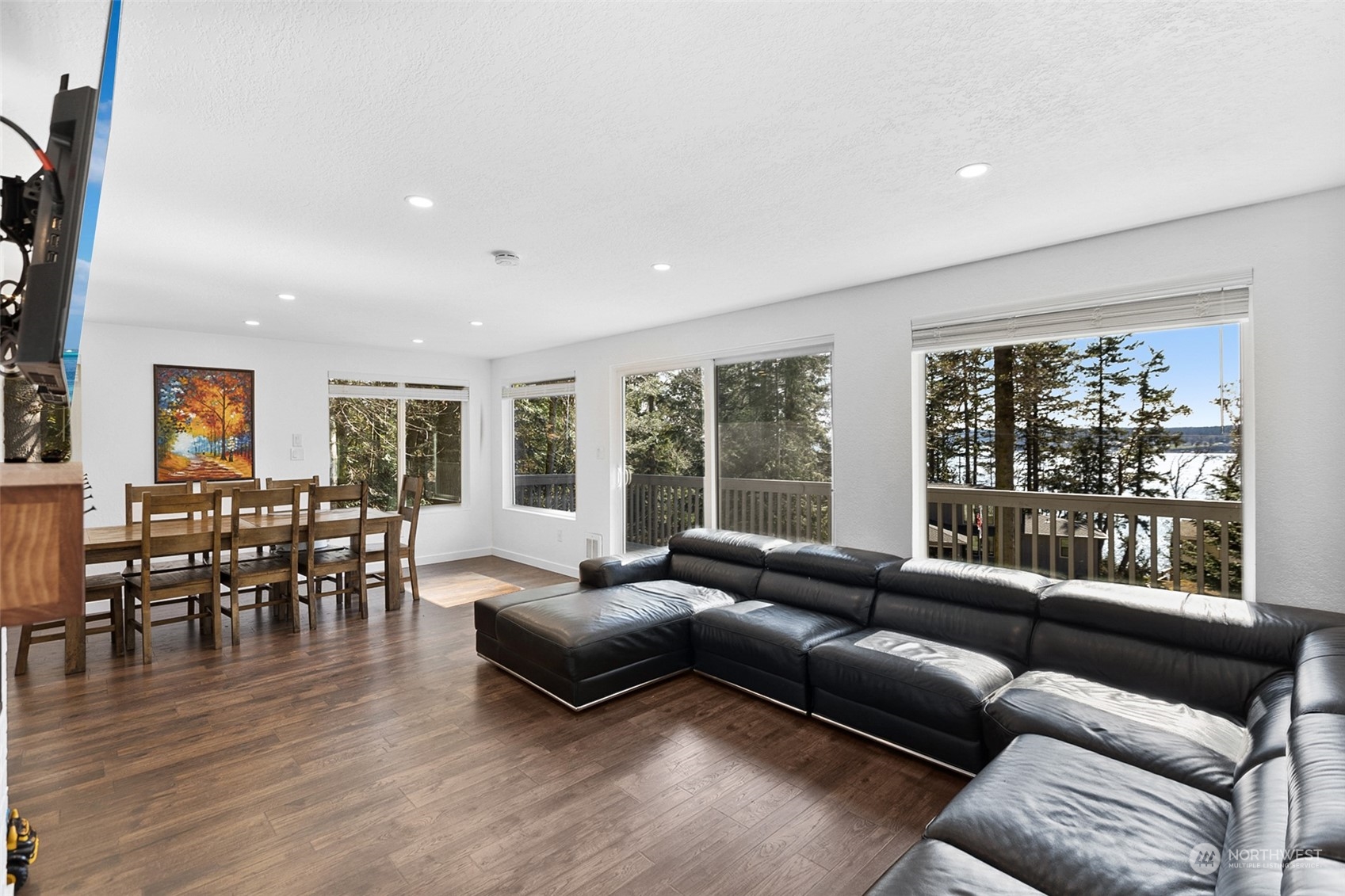 2097 Gull Way Camano Island, WA 98282 - Photo 10 of 35 a living room with furniture and a wooden floor