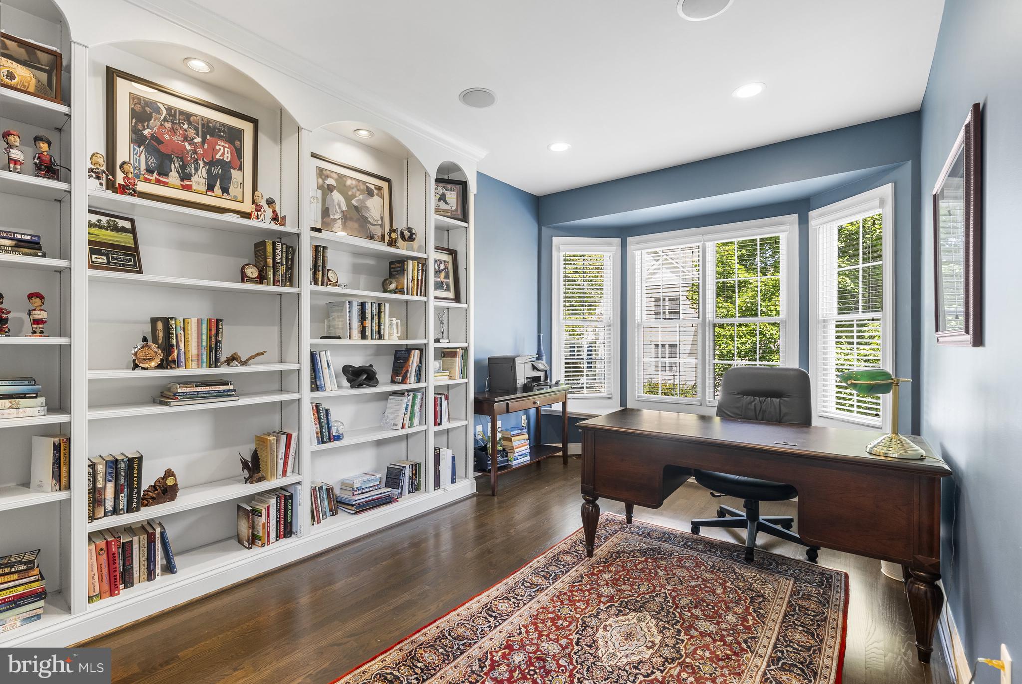 10205 Deep Skies Drive Laurel, MD 20723 - Photo 12 of 40 a living room with furniture and a book shelf