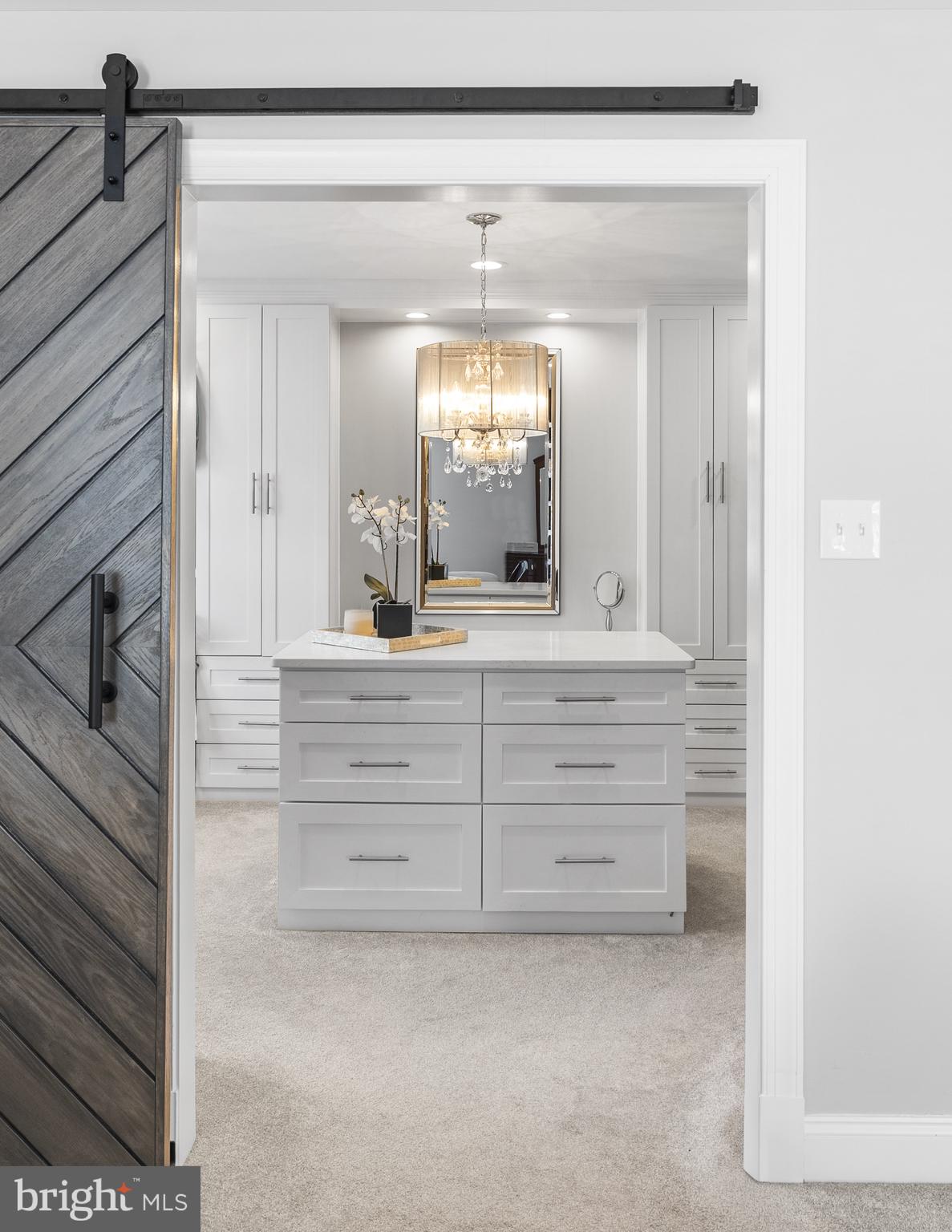 10205 Deep Skies Drive Laurel, MD 20723 - Photo 14 of 40 a bathroom with a granite countertop sink and a mirror