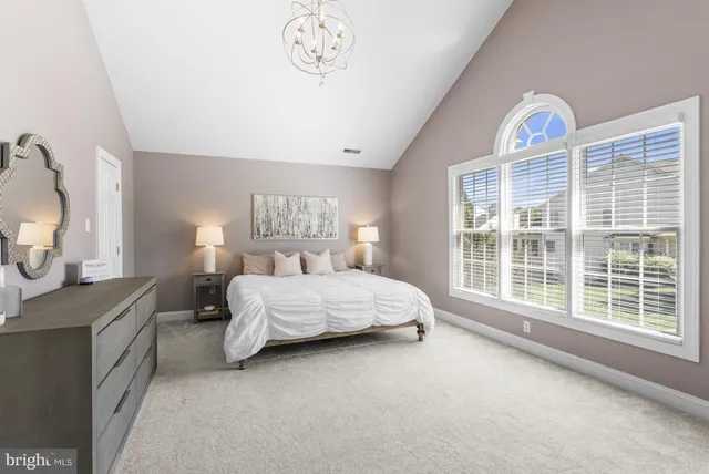 a spacious bathroom with a bathtub and shower