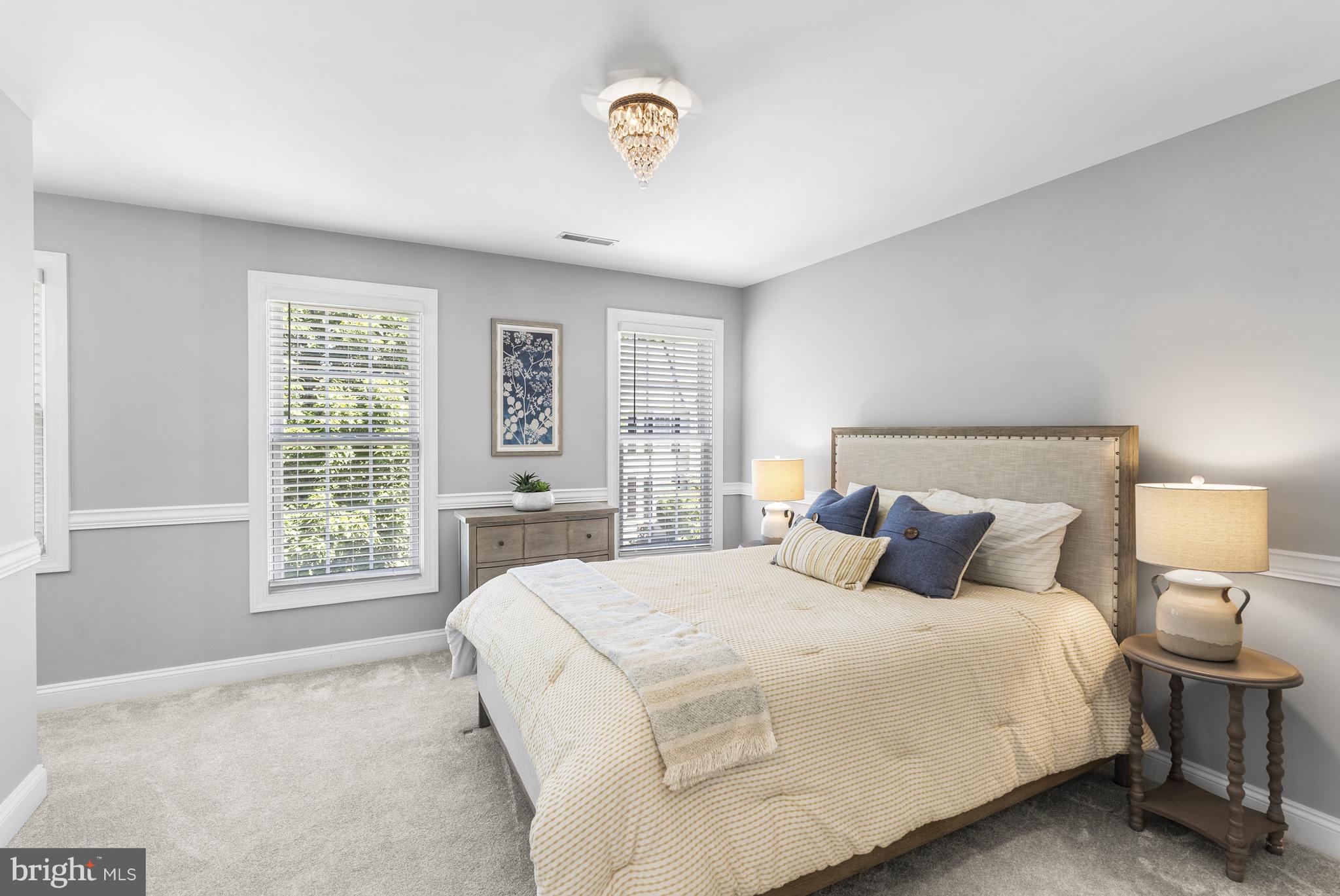 10205 Deep Skies Drive Laurel, MD 20723 - Photo 22 of 40 a bedroom with a bed and a window