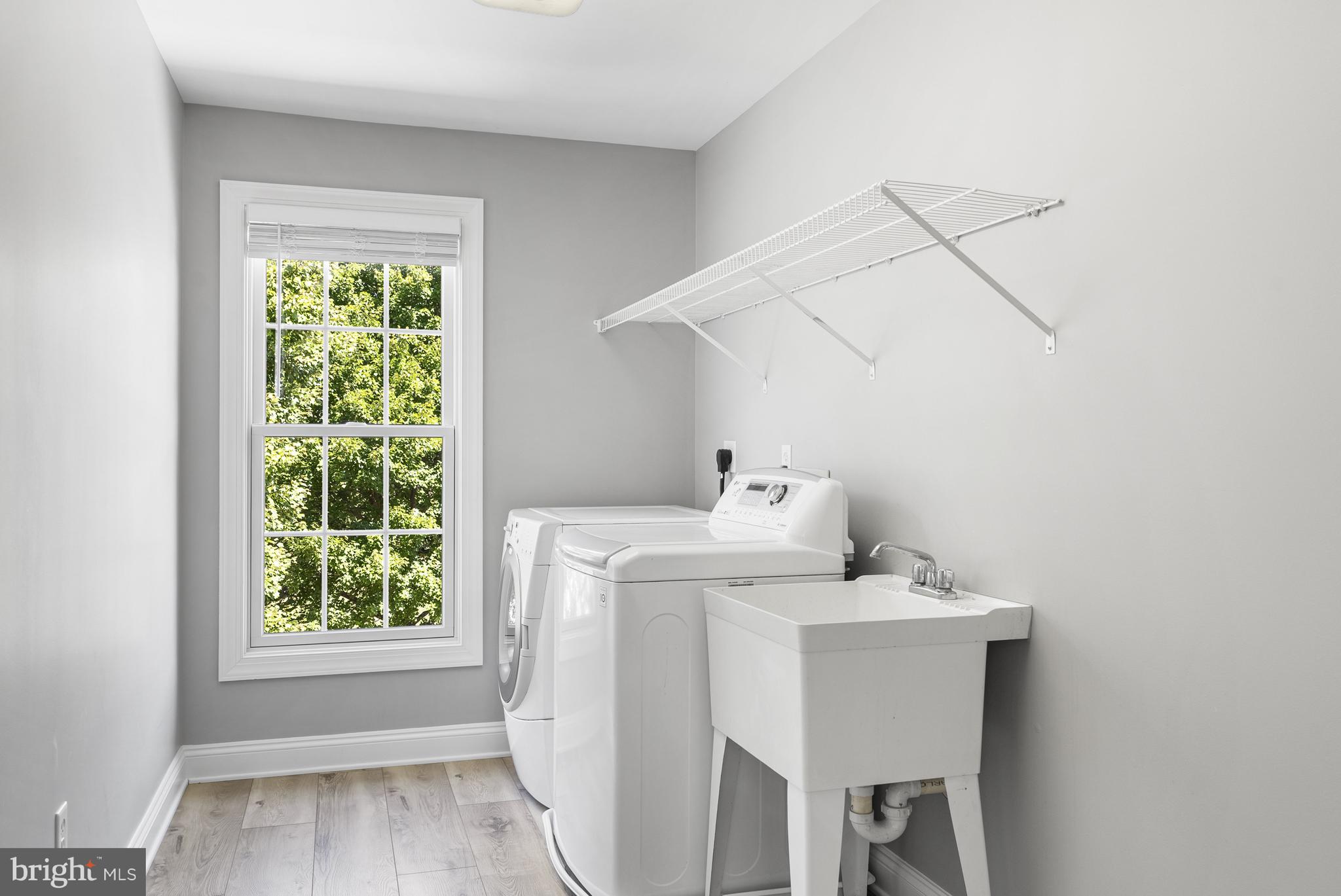10205 Deep Skies Drive Laurel, MD 20723 - Photo 23 of 40 a utility room with dryer and washer