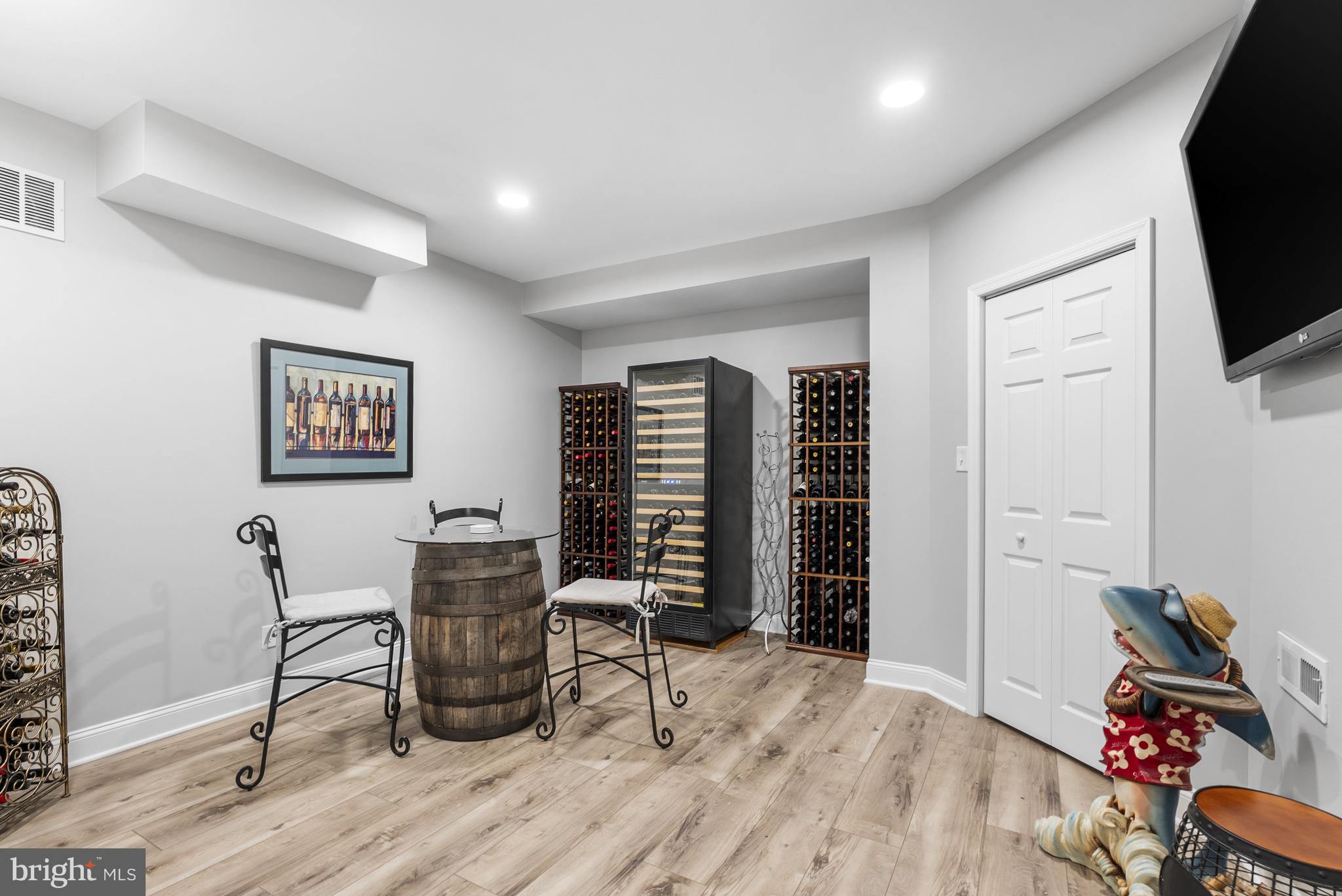 10205 Deep Skies Drive Laurel, MD 20723 - Photo 27 of 40 a view of a livingroom with furniture and an empty room