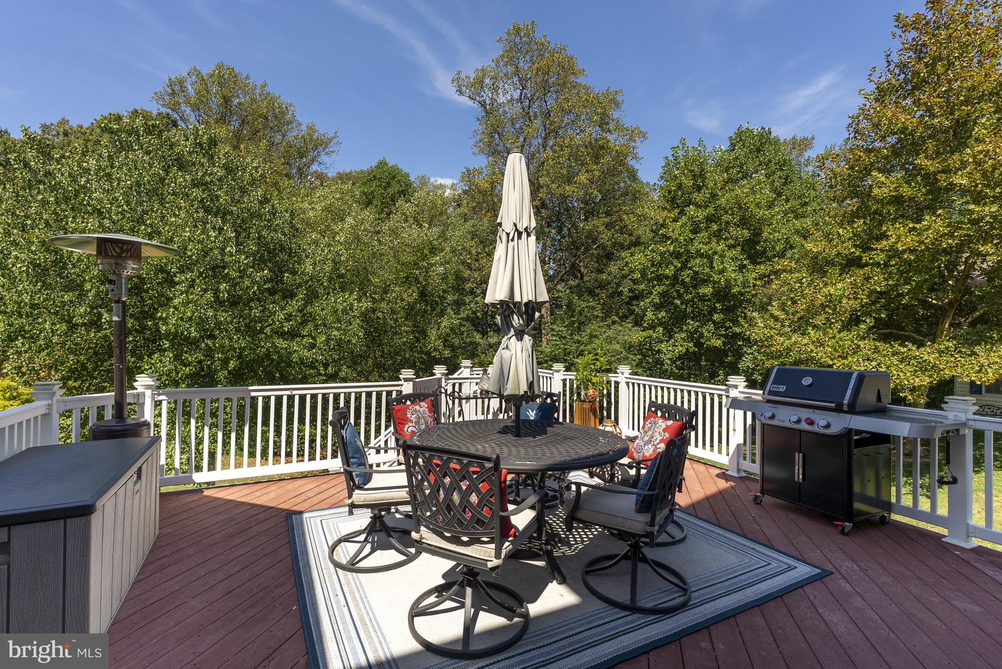 10205 Deep Skies Drive Laurel, MD 20723 - Photo 29 of 40 a view of a table and chairs in the roof deck