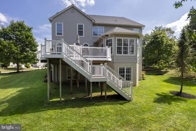 a view of a table and chairs in the roof deck