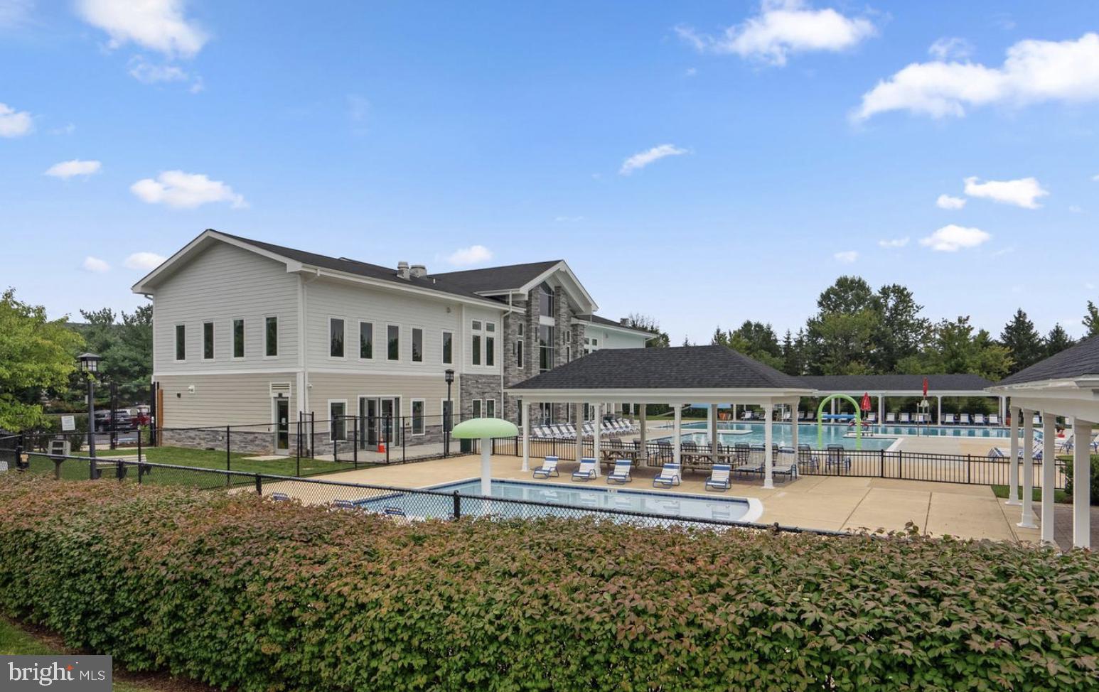 10205 Deep Skies Drive Laurel, MD 20723 - Photo 34 of 40 a front view of a house with a yard