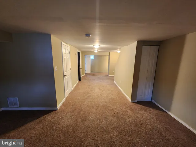 a view of hallway with livingroom