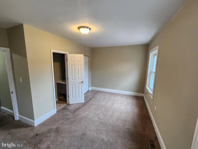 an empty room with a natural light