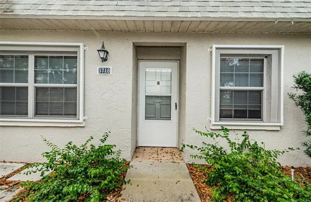 a kitchen with stainless steel appliances a refrigerator stove and microwave