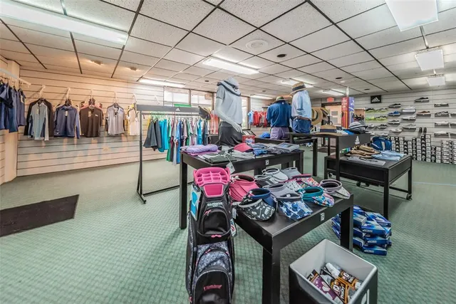 a living room with lots of furniture and lots of wooden floors