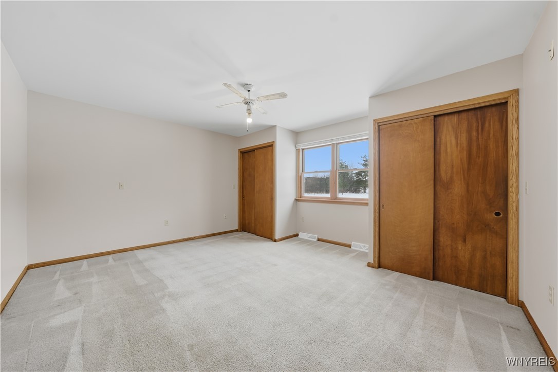 203 Siebert Road Lancaster, NY 14086 - Photo 18 of 48 Primary first floor bedroom