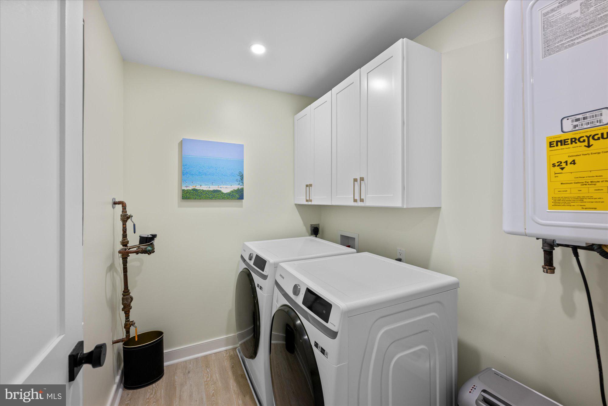 6700 Rannoch Road Bethesda, MD 20817 - Photo 26 of 36 a view of a storage & utility room with a washer dryer