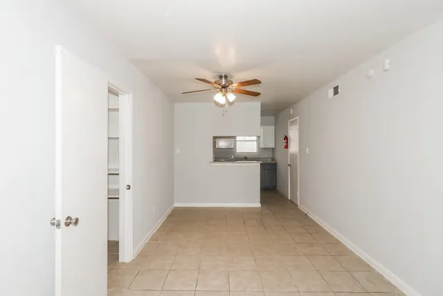a view of a kitchen with a sink and dishwasher