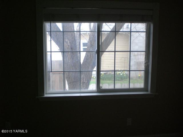 2906 Wiley Road Yakima, WA 98903 - Photo 23 of 27 a view of an empty room with a window