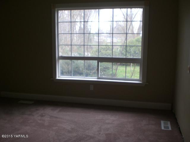 2906 Wiley Road Yakima, WA 98903 - Photo 8 of 27 a view of an empty room with a window