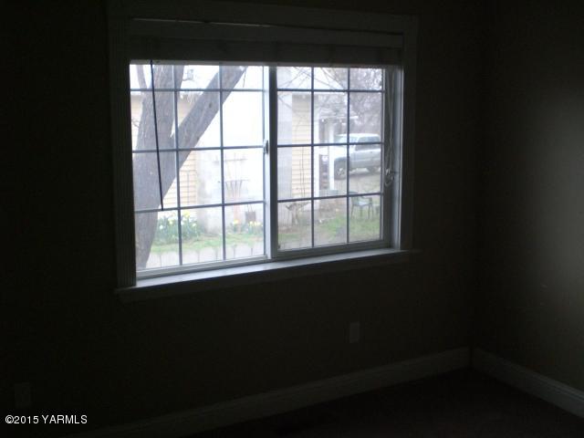 2906 Wiley Road Yakima, WA 98903 - Photo 10 of 27 a view of an empty room with a window