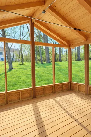 a view of a backyard of the house